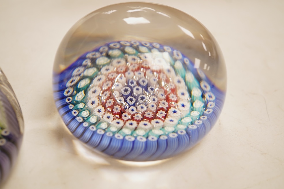 Three Whitefriars glass paperweights and a boxed St Louis sulphide paperweights, largest 7.5cm in diamter